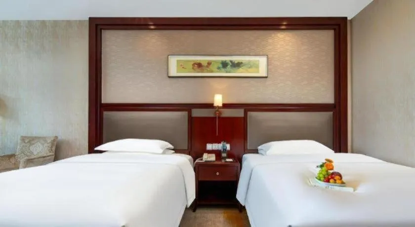 Bed in Taishun Xiangzhou New Century Hotel