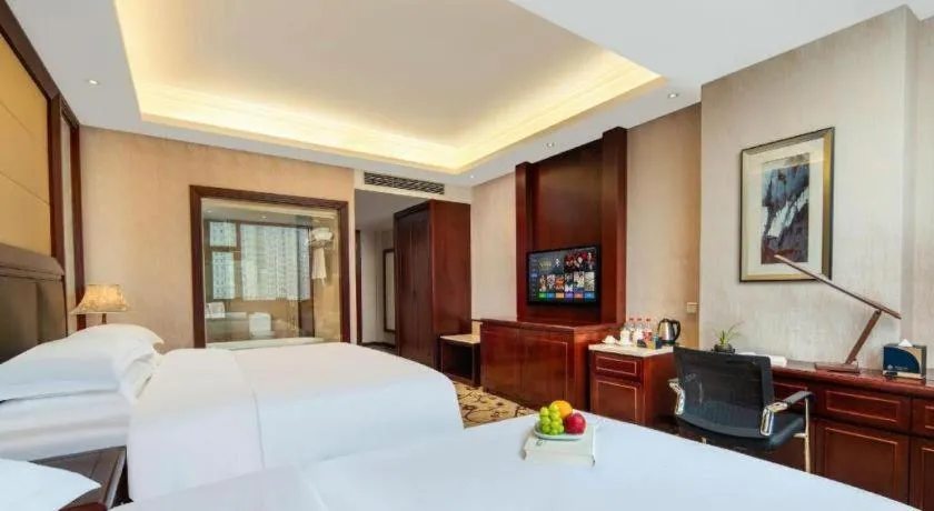 Bed in Taishun Xiangzhou New Century Hotel