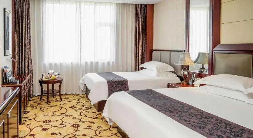 Bed in Taishun Xiangzhou New Century Hotel