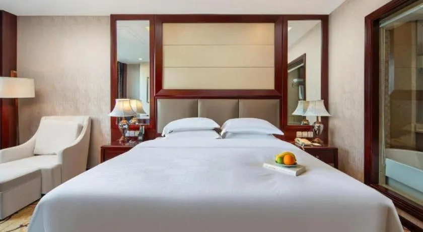 Bed in Taishun Xiangzhou New Century Hotel