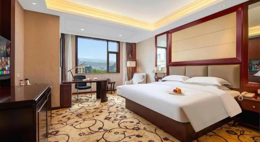 Bed in Taishun Xiangzhou New Century Hotel