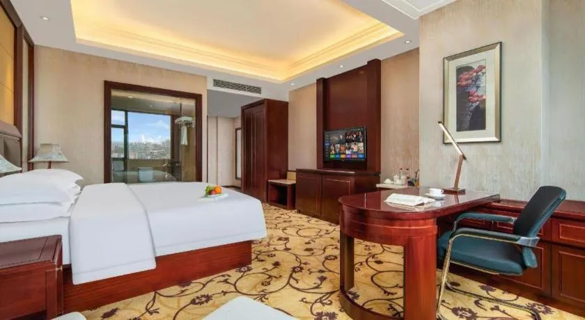 Bed in Taishun Xiangzhou New Century Hotel