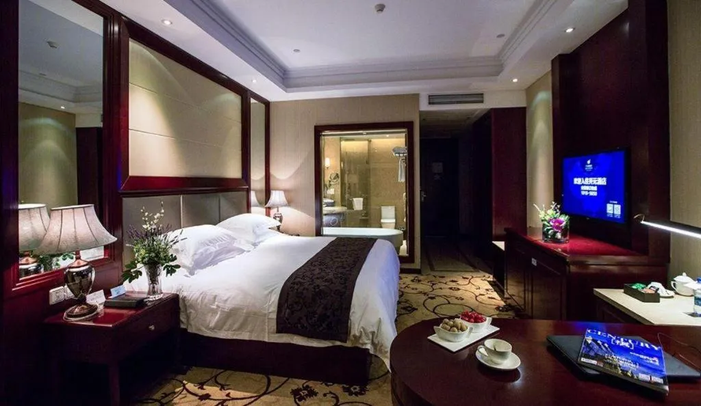 Bed in Taishun Xiangzhou New Century Hotel