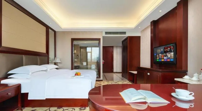 Bed in Taishun Xiangzhou New Century Hotel