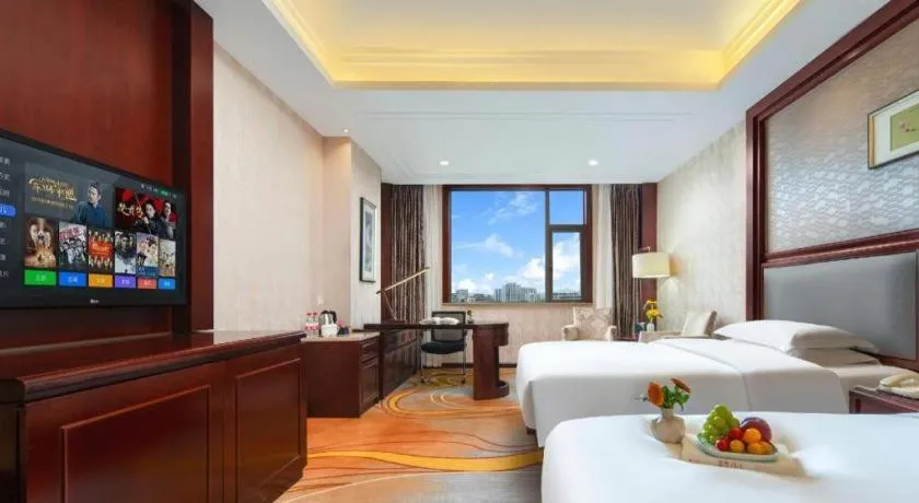 Bed in Taishun Xiangzhou New Century Hotel