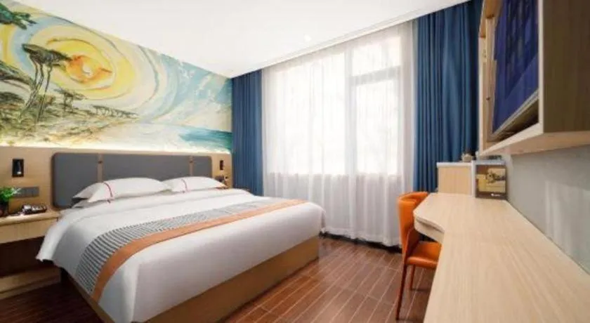 Bed in JIAN AI XI YUE HOTEL