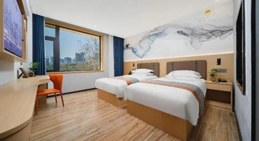 Bed in JIAN AI XI YUE HOTEL Bed in JIAN AI XI YUE HOTEL