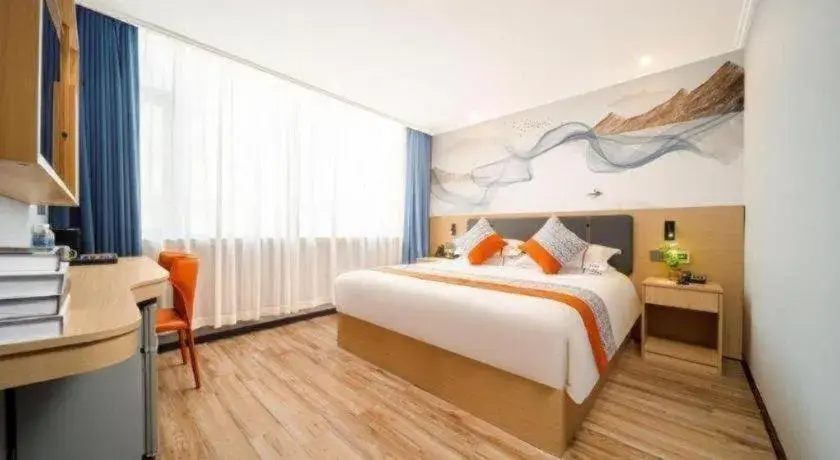 Bed in JIAN AI XI YUE HOTEL Bed in JIAN AI XI YUE HOTEL