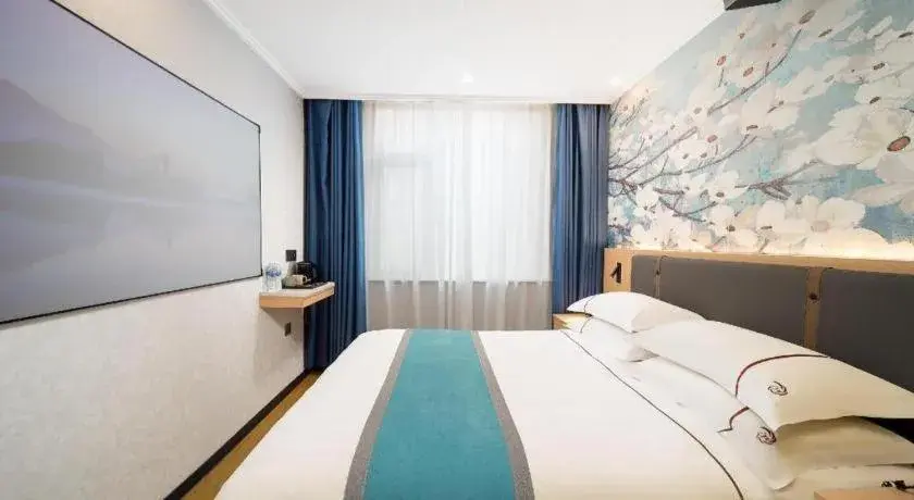 Bed in JIAN AI XI YUE HOTEL Bed in JIAN AI XI YUE HOTEL