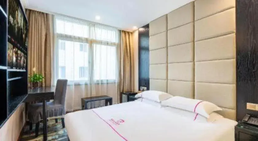 Bed in JIAN AI XI YUE HOTEL Bed in JIAN AI XI YUE HOTEL