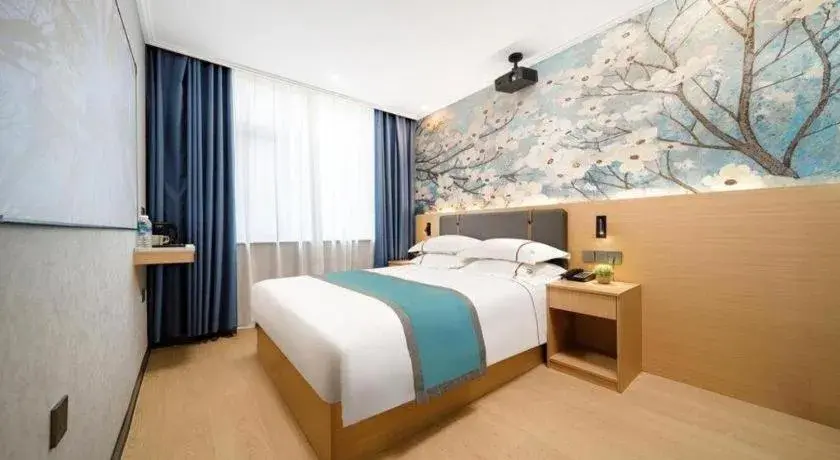 Bed in JIAN AI XI YUE HOTEL Bed in JIAN AI XI YUE HOTEL