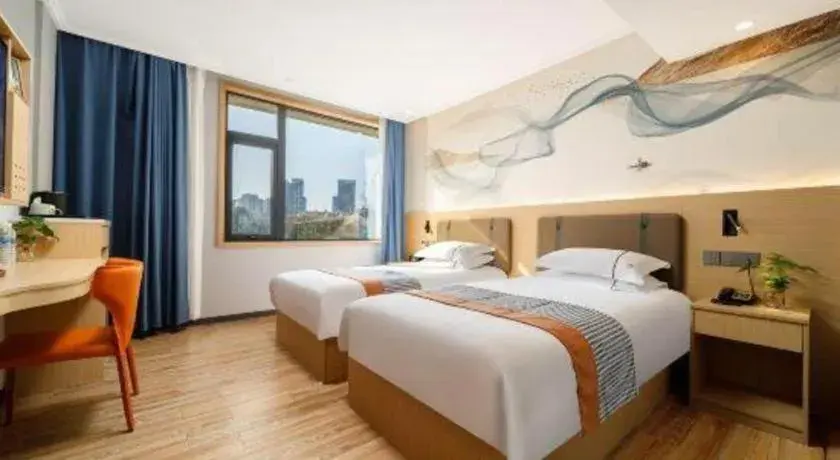 Bed in JIAN AI XI YUE HOTEL Bed in JIAN AI XI YUE HOTEL