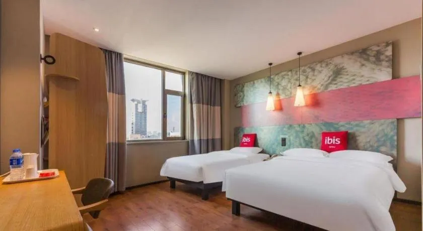 Bed in Ibis Xinzhou Qiyi RD