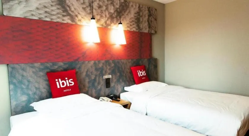 Bed in Ibis Xinzhou Qiyi RD