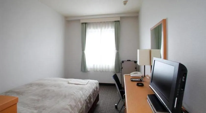 Bed in Sapporo Hotel Yamachi