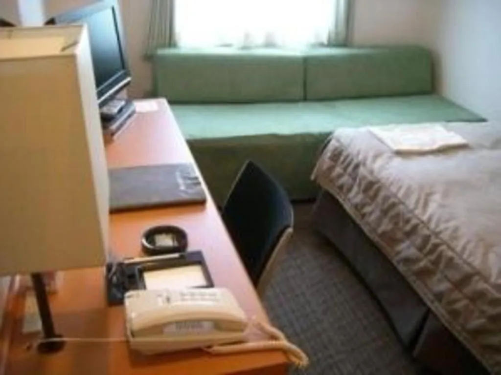 Bed in Sapporo Hotel Yamachi