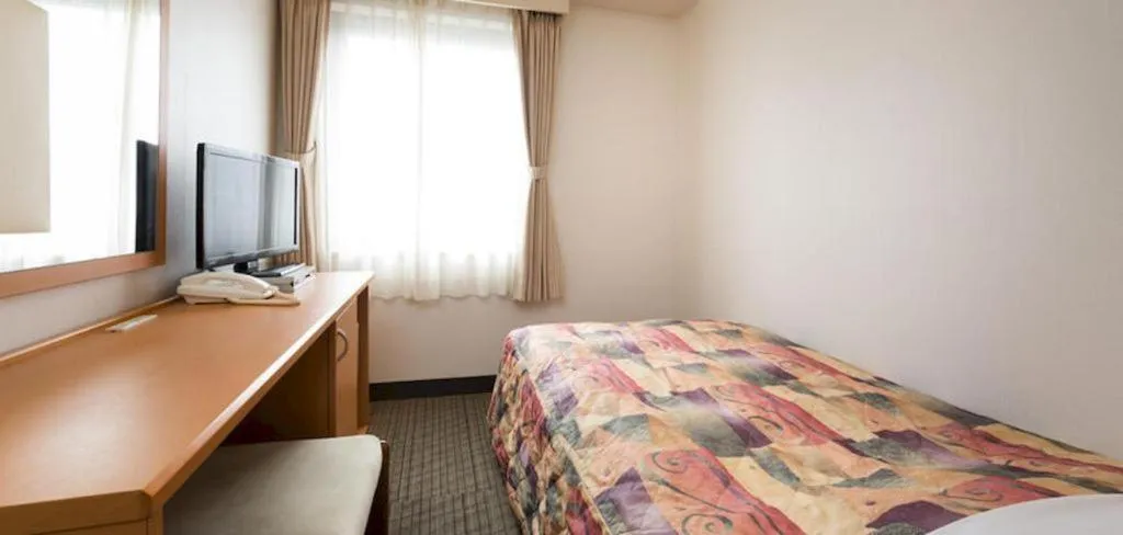 Bed in Sapporo Hotel Yamachi