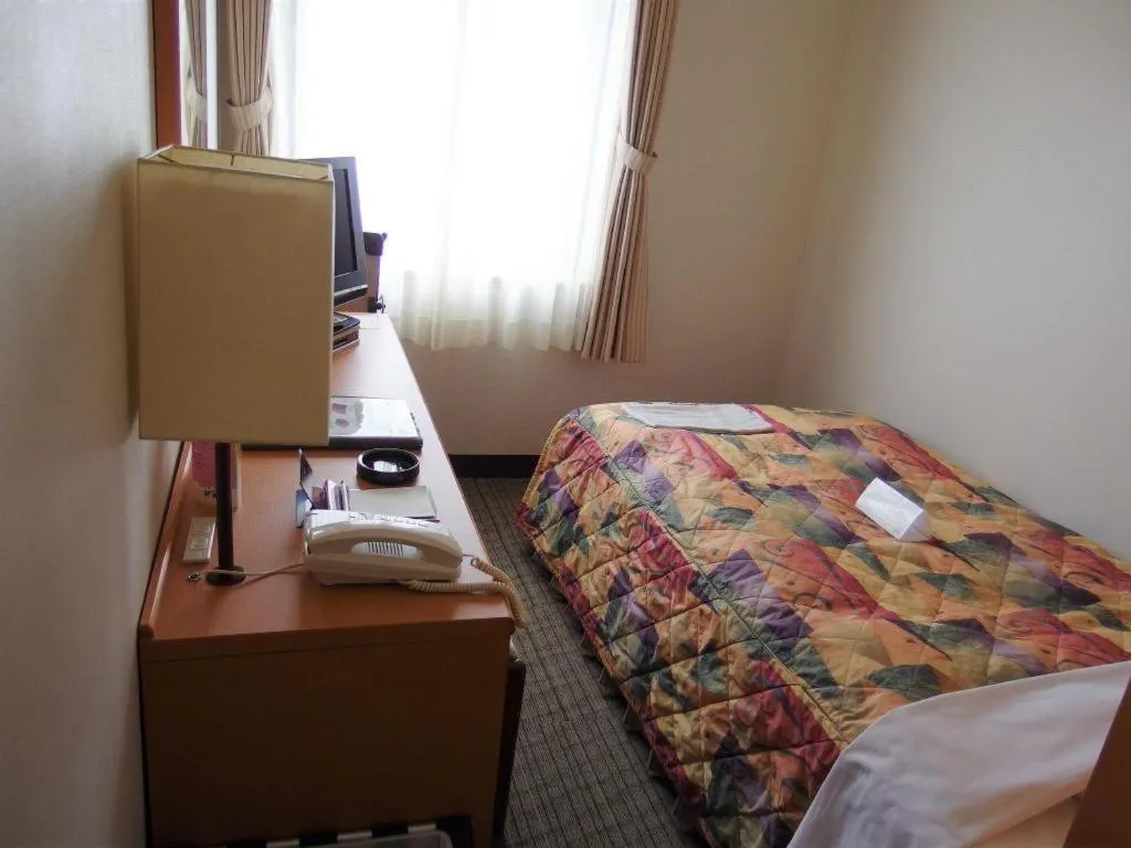 Bed in Sapporo Hotel Yamachi