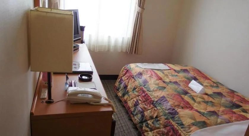 Bed in Sapporo Hotel Yamachi