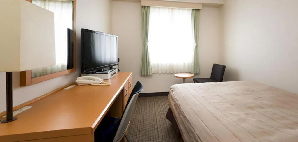 Bed in Sapporo Hotel Yamachi