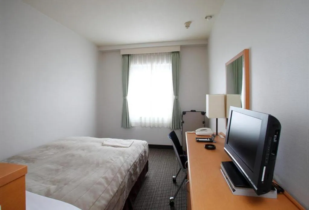 Bed in Sapporo Hotel Yamachi