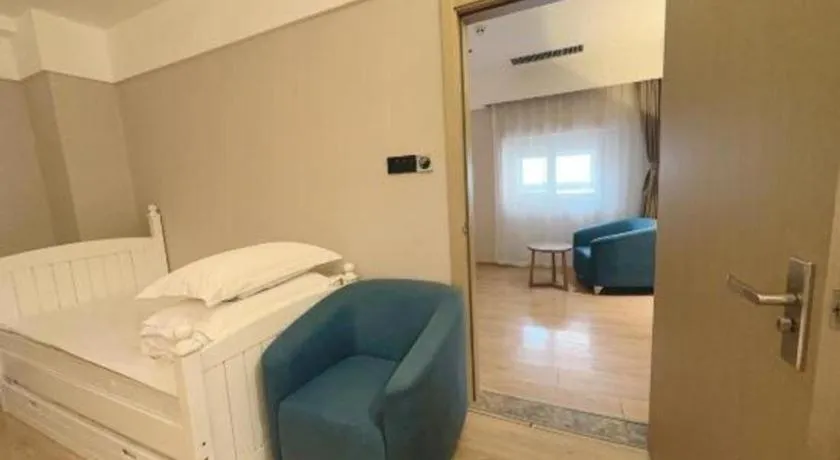 Bed in Metropolo Hotel Qingdao Wusi Square Xiaomaidao