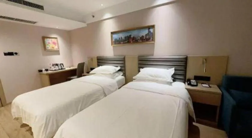 Bed in Metropolo Hotel Qingdao Wusi Square Xiaomaidao