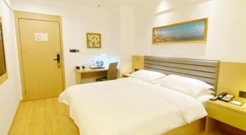 Bed in Metropolo Hotel Qingdao Wusi Square Xiaomaidao