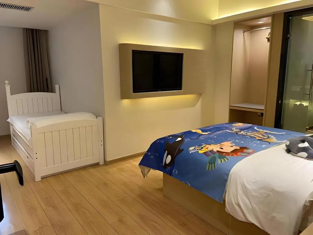 Bed in Metropolo Hotel Qingdao Wusi Square Xiaomaidao