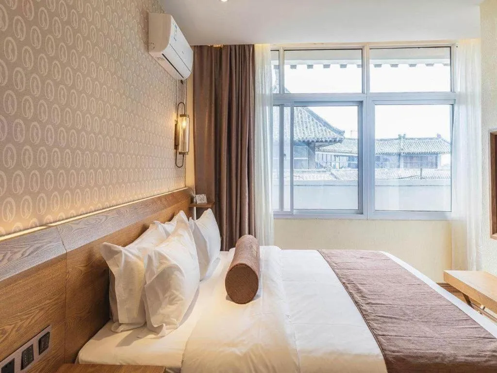 Bed in James Joyce Coffetel Qufu Tourist Center Gulou Street Sankong Scenic Spot