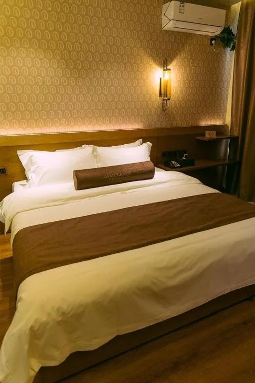 Bed in James Joyce Coffetel Qufu Tourist Center Gulou Street Sankong Scenic Spot
