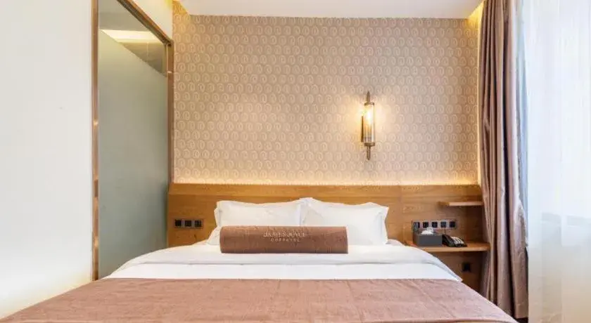 Bed in James Joyce Coffetel Qufu Tourist Center Gulou Street Sankong Scenic Spot Bed in James Joyce Coffetel Qufu Tourist Center Gulou Street Sankong Scenic Spot