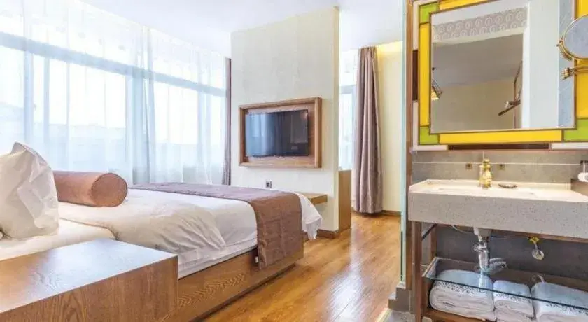 Bed in James Joyce Coffetel Qufu Tourist Center Gulou Street Sankong Scenic Spot Bed in James Joyce Coffetel Qufu Tourist Center Gulou Street Sankong Scenic Spot