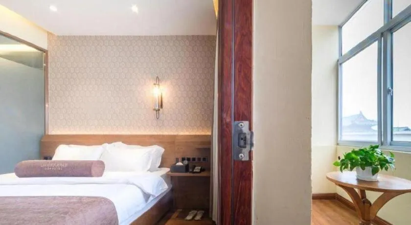 Bed in James Joyce Coffetel Qufu Tourist Center Gulou Street Sankong Scenic Spot