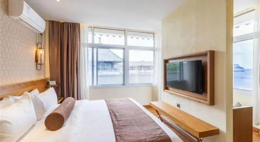 Bed in James Joyce Coffetel Qufu Tourist Center Gulou Street Sankong Scenic Spot Bed in James Joyce Coffetel Qufu Tourist Center Gulou Street Sankong Scenic Spot