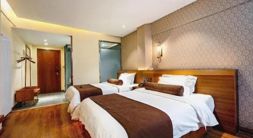 Bed in James Joyce Coffetel Qufu Tourist Center Gulou Street Sankong Scenic Spot Bed in James Joyce Coffetel Qufu Tourist Center Gulou Street Sankong Scenic Spot