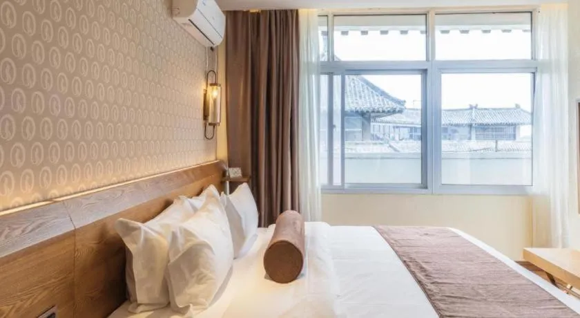 Bed in James Joyce Coffetel Qufu Tourist Center Gulou Street Sankong Scenic Spot