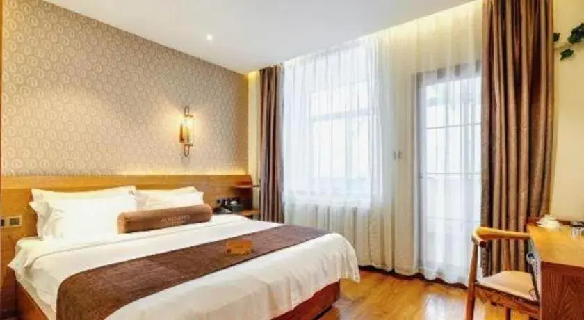 Bed in James Joyce Coffetel Qufu Tourist Center Gulou Street Sankong Scenic Spot Bed in James Joyce Coffetel Qufu Tourist Center Gulou Street Sankong Scenic Spot