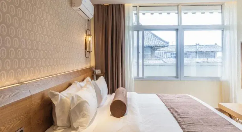 Bed in James Joyce Coffetel Qufu Tourist Center Gulou Street Sankong Scenic Spot Bed in James Joyce Coffetel Qufu Tourist Center Gulou Street Sankong Scenic Spot