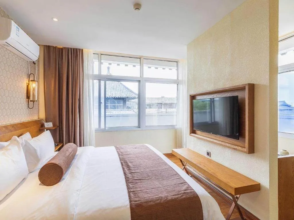 Bed in James Joyce Coffetel Qufu Tourist Center Gulou Street Sankong Scenic Spot