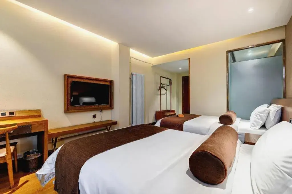 Bed in James Joyce Coffetel Qufu Tourist Center Gulou Street Sankong Scenic Spot Bed in James Joyce Coffetel Qufu Tourist Center Gulou Street Sankong Scenic Spot