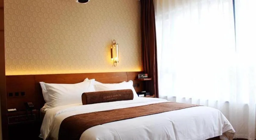 Bed in James Joyce Coffetel Chengdu Jichang Road Shenxianshu