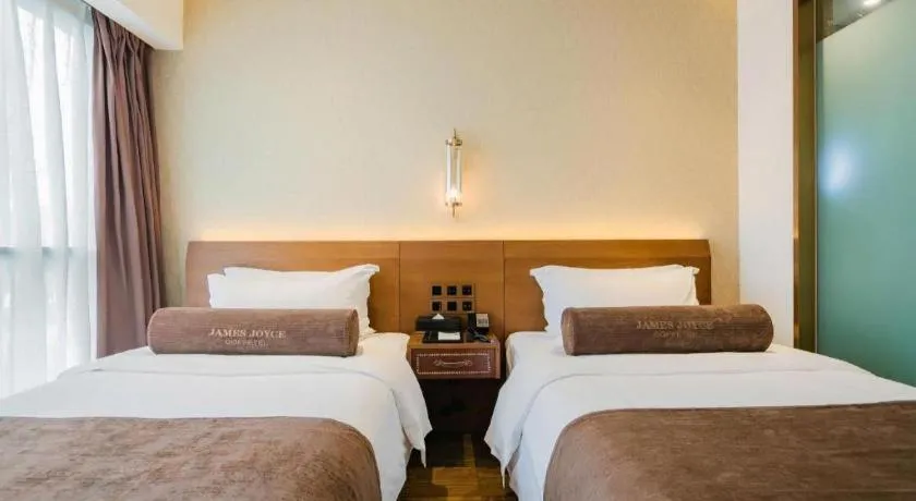 Bed in James Joyce Coffetel Chengdu Jichang Road Shenxianshu