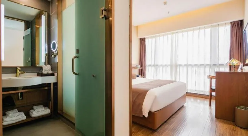 Bed in James Joyce Coffetel Chengdu Jichang Road Shenxianshu