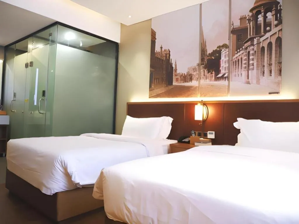 Bed in James Joyce Coffetel Guangzhou Dongxiaonan Metro Station Branch