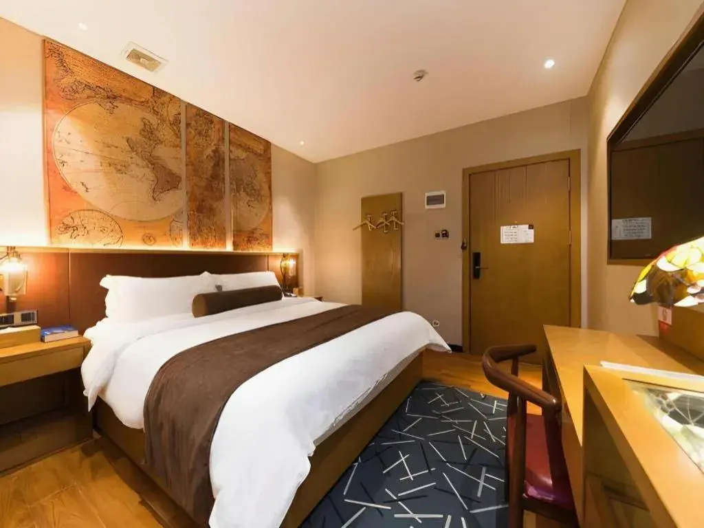 Bed in James Joyce Coffetel Guangzhou Dongxiaonan Metro Station Branch Bed in James Joyce Coffetel Guangzhou Dongxiaonan Metro Station Branch