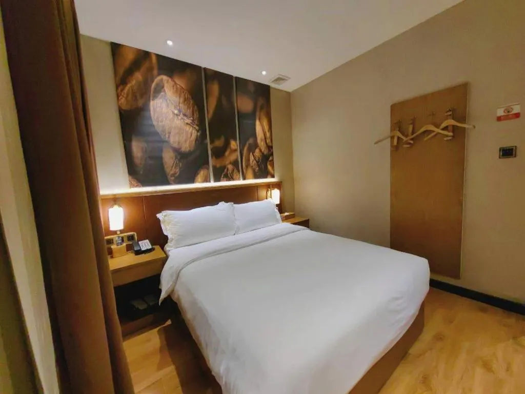 Bed in James Joyce Coffetel Guangzhou Dongxiaonan Metro Station Branch