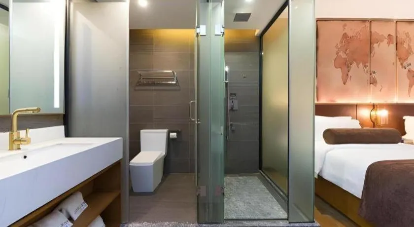 Bed in James Joyce Coffetel Guangzhou Dongxiaonan Metro Station Branch