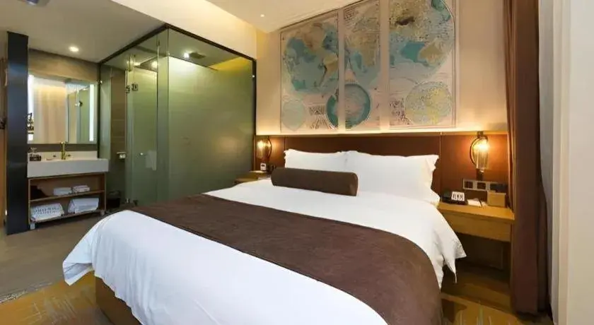 Bed in James Joyce Coffetel Guangzhou Dongxiaonan Metro Station Branch Bed in James Joyce Coffetel Guangzhou Dongxiaonan Metro Station Branch