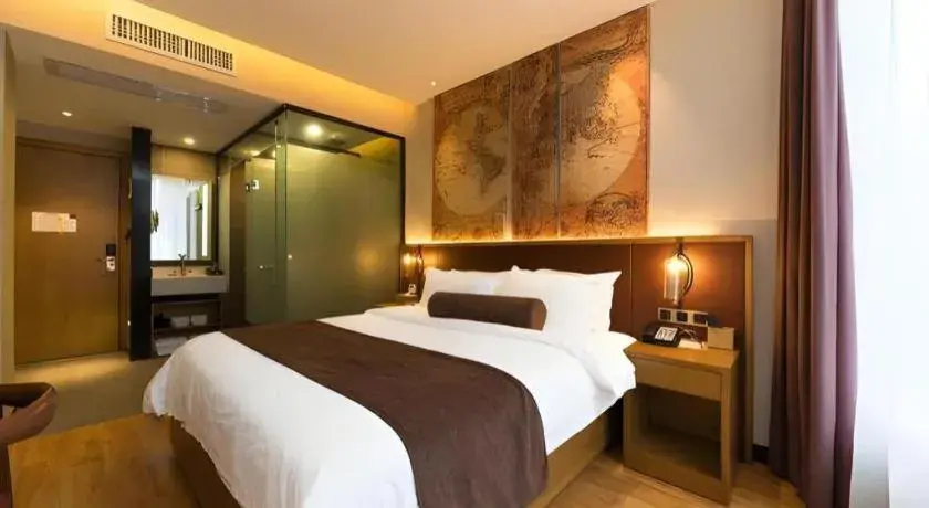 Bed in James Joyce Coffetel Guangzhou Dongxiaonan Metro Station Branch Bed in James Joyce Coffetel Guangzhou Dongxiaonan Metro Station Branch